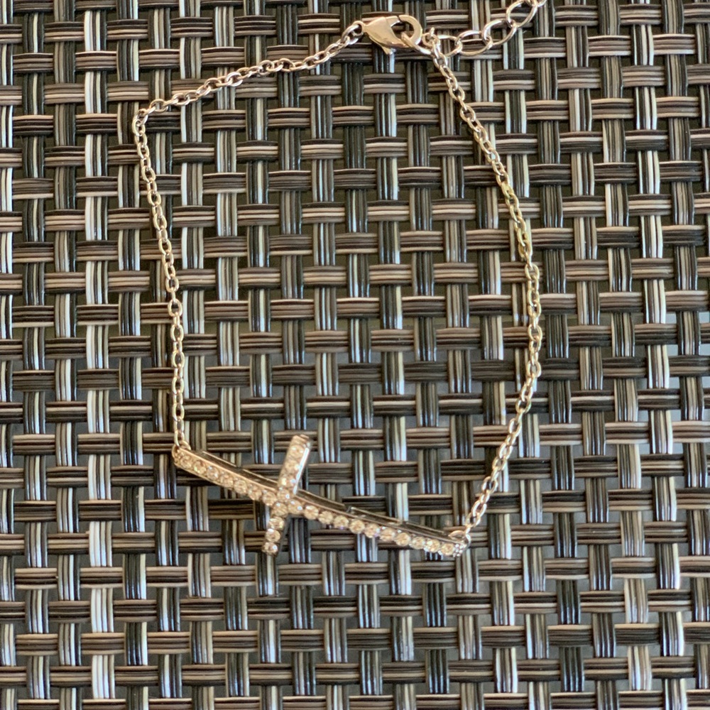 Small rhinestone cross bracelet!